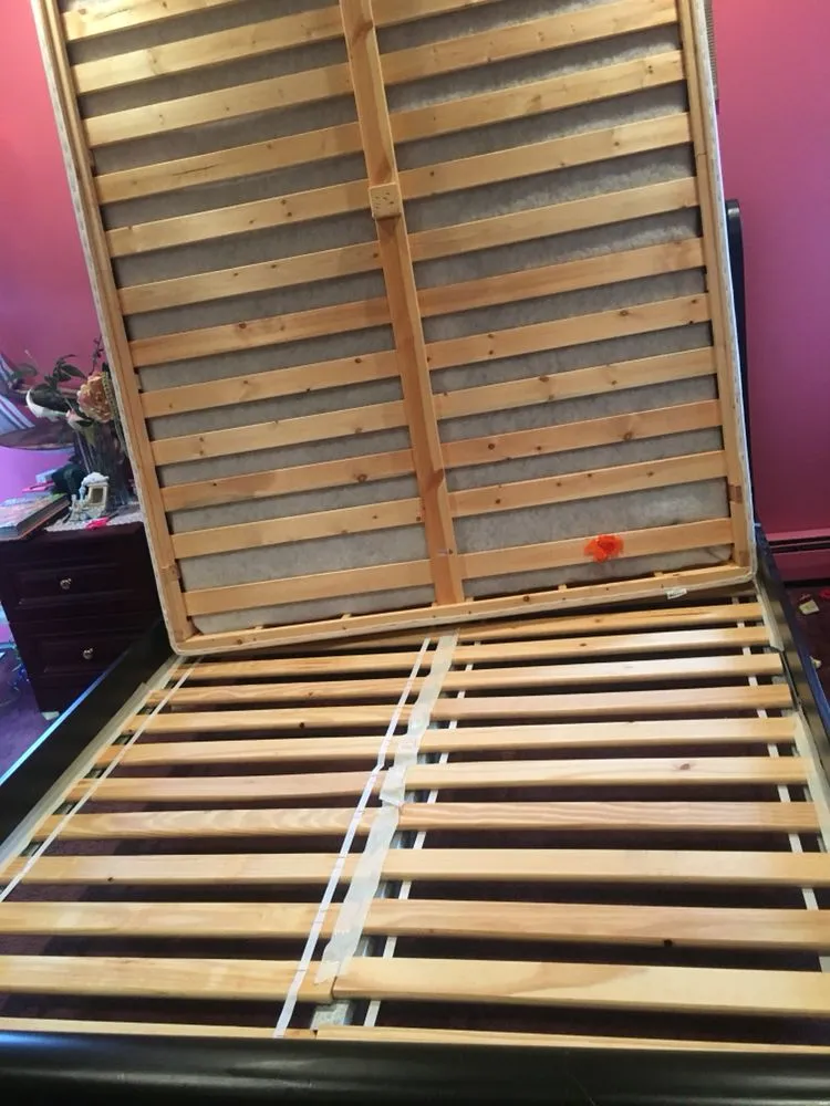 Bed frame dismantled down to the slats so every joint can be treated